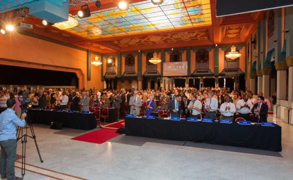 Room of WIPO delegates clap as they adopt the Marrakesh Treaty. Room of WIPO delegates clap as they adopt the Marrakesh Treaty.
