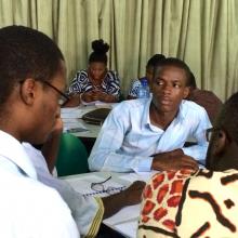 Public librarians in small group during Ghana training. 