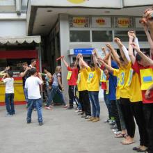 Young people taking part in a 'No to TB!' flash mob in the town shopping area.