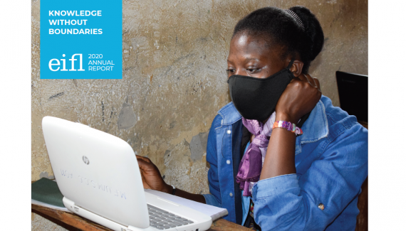 Cover 2020 Annual Report showing a young woman wearing a COVID-19 protective mask using computer in a Ugandan village library.