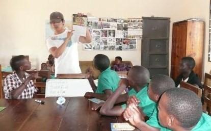 Deaf and hearing children learn together in Kitengesa Community Library.