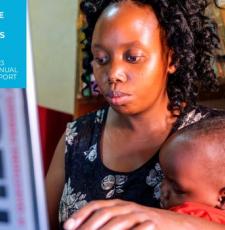 Image of the cover of the 2023 EIFL Annual Report, showing an Ugandan mother learning to use a computer, with a child on her lap. 