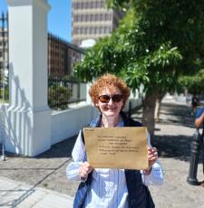 Teresa Hackett - EIFL Copyright and Libraries Programme Manager - with the submission outside the Houses of Parliament in Cape Town.