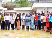 The 20 public librarians selected to be trainers with their trainers in a group photo. 