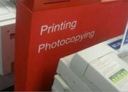 Image of a book next to a printer, to represent copying. Source: Monash University Malaysia: https://www.monash.edu.my/library/services-facilities/computing/printing