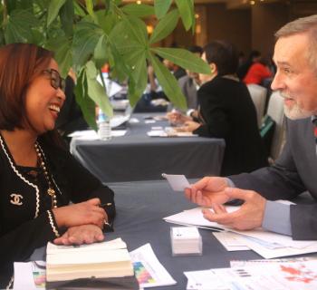 An EIFL partner and an EIFL Coordinator share a laugh during discussions at the EIFL An EIFL publisher partner and an EIFL Coordinator from Belarus share a laugh during discussions.