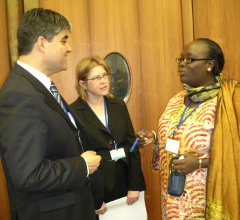 Awa Cissé, EIFL Copyright Coordinator in Senegal, debates copyright with two other delegates at WIPO.