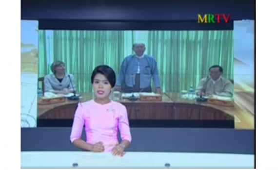 screen shot of television news presenter
