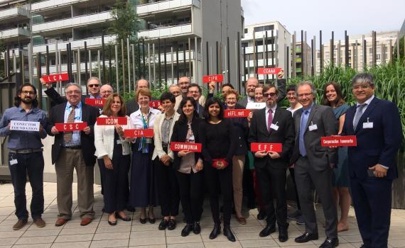 Group photo of representatives from library, archive and education sectors outside the WIPO building in Geneva. 