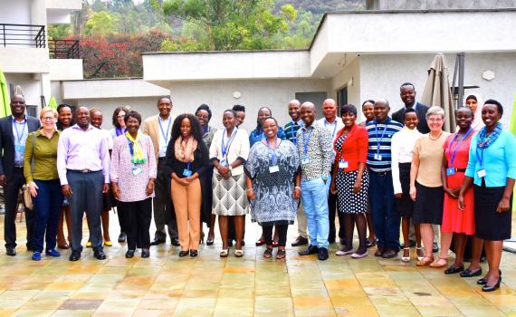 The 20 public librarians selected to be trainers with their trainers in a group photo. 