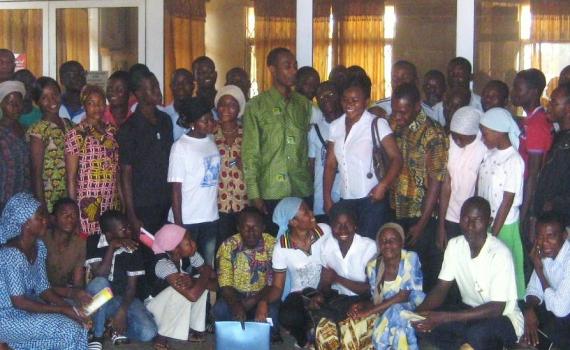 Library director with a group of successful trainees in the library.