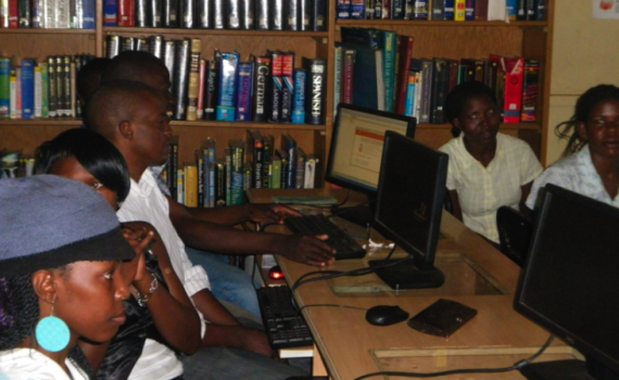 Young people learn computer and internet skills in National Library of Uganda in Kampala.