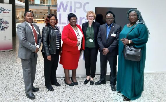 Group photo of the EIFL team at WIPO SCCR/39, from left: Joseph Kavula and Janegrace Kinyanjui from Kenya; Kathy Matsika from Zimbabwe, Teresa Hackett, from EIFL, Dick Kawooya from Uganda/USA, and Awa Diouf Cissé from Senegal.