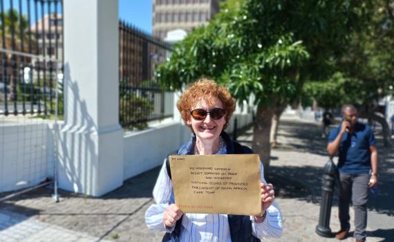 Teresa Hackett - EIFL Copyright and Libraries Programme Manager - with the submission outside the Houses of Parliament in Cape Town.