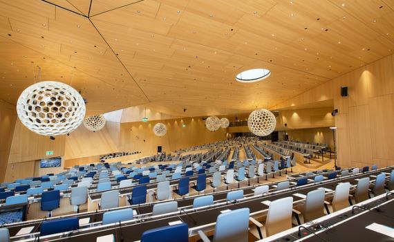 The WIPO Conference Hall in Geneva, Switzerland - a large hall with tiered seating. 